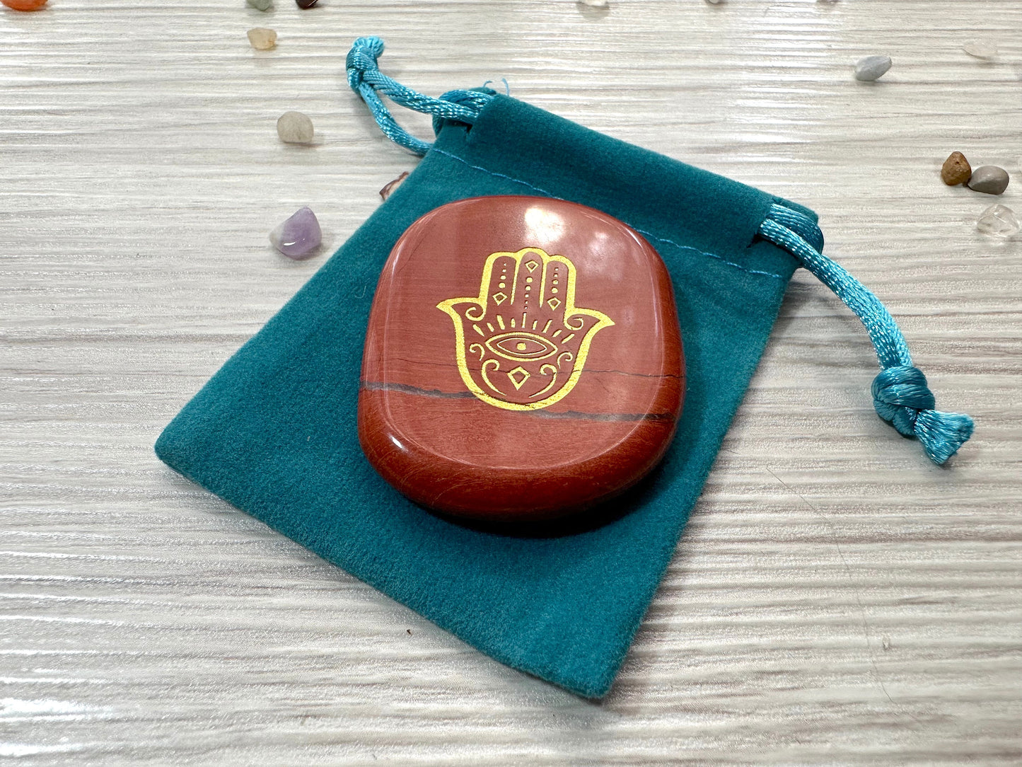 Engraved Palm Stone. Hamsa / Fatima symbol in Red Jasper