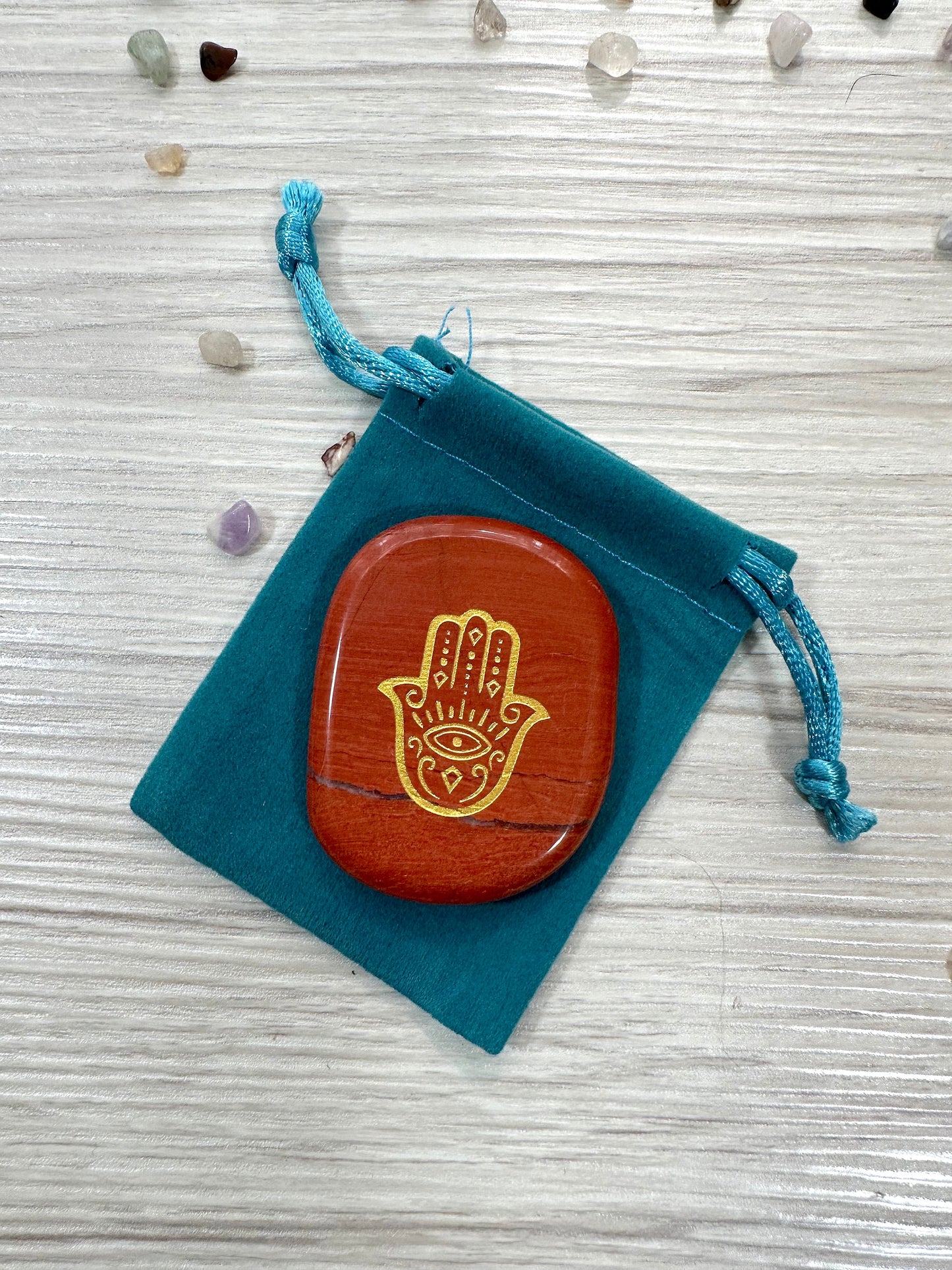 Engraved Palm Stone. Hamsa / Fatima symbol in Red Jasper