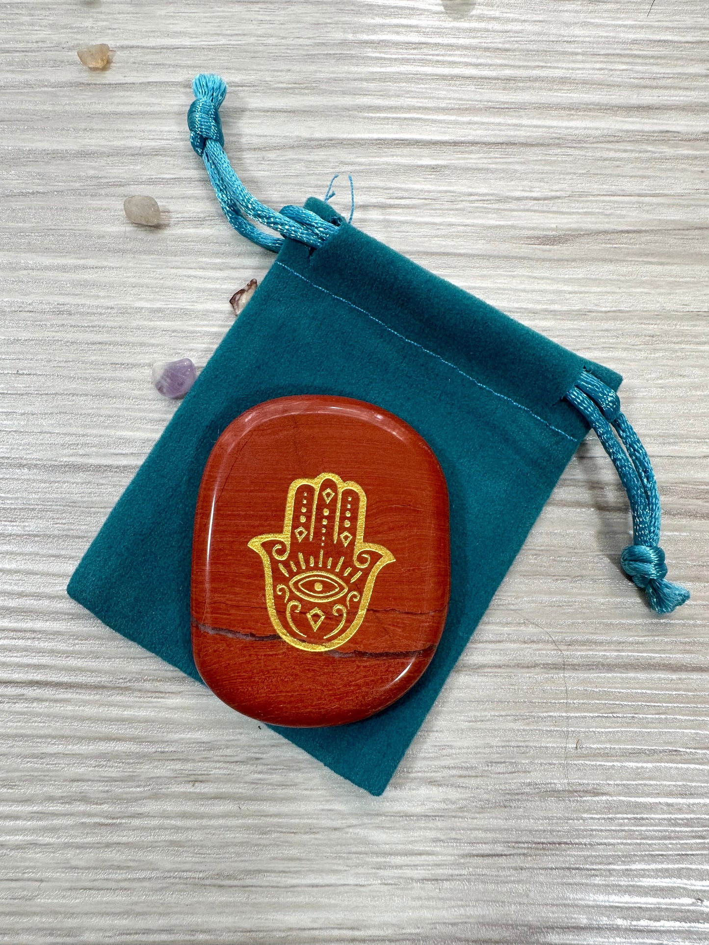 Engraved Palm Stone. Hamsa / Fatima symbol in Red Jasper